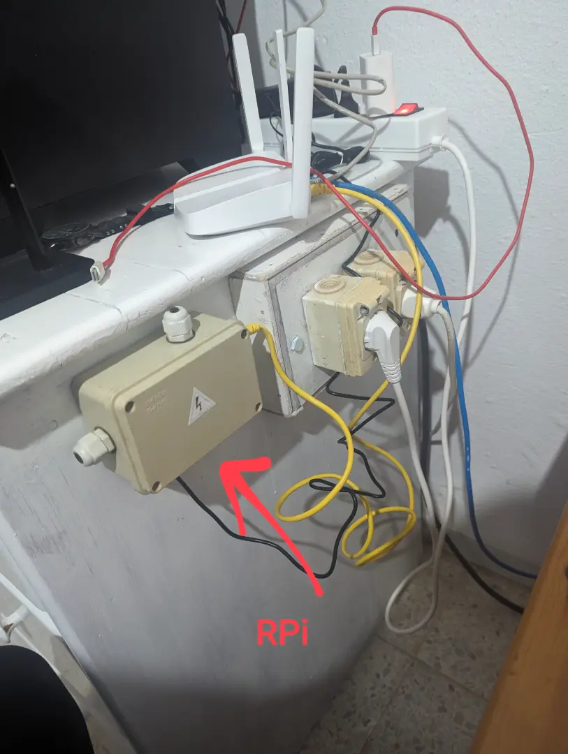 Picture of my RPi mounted to my old desk